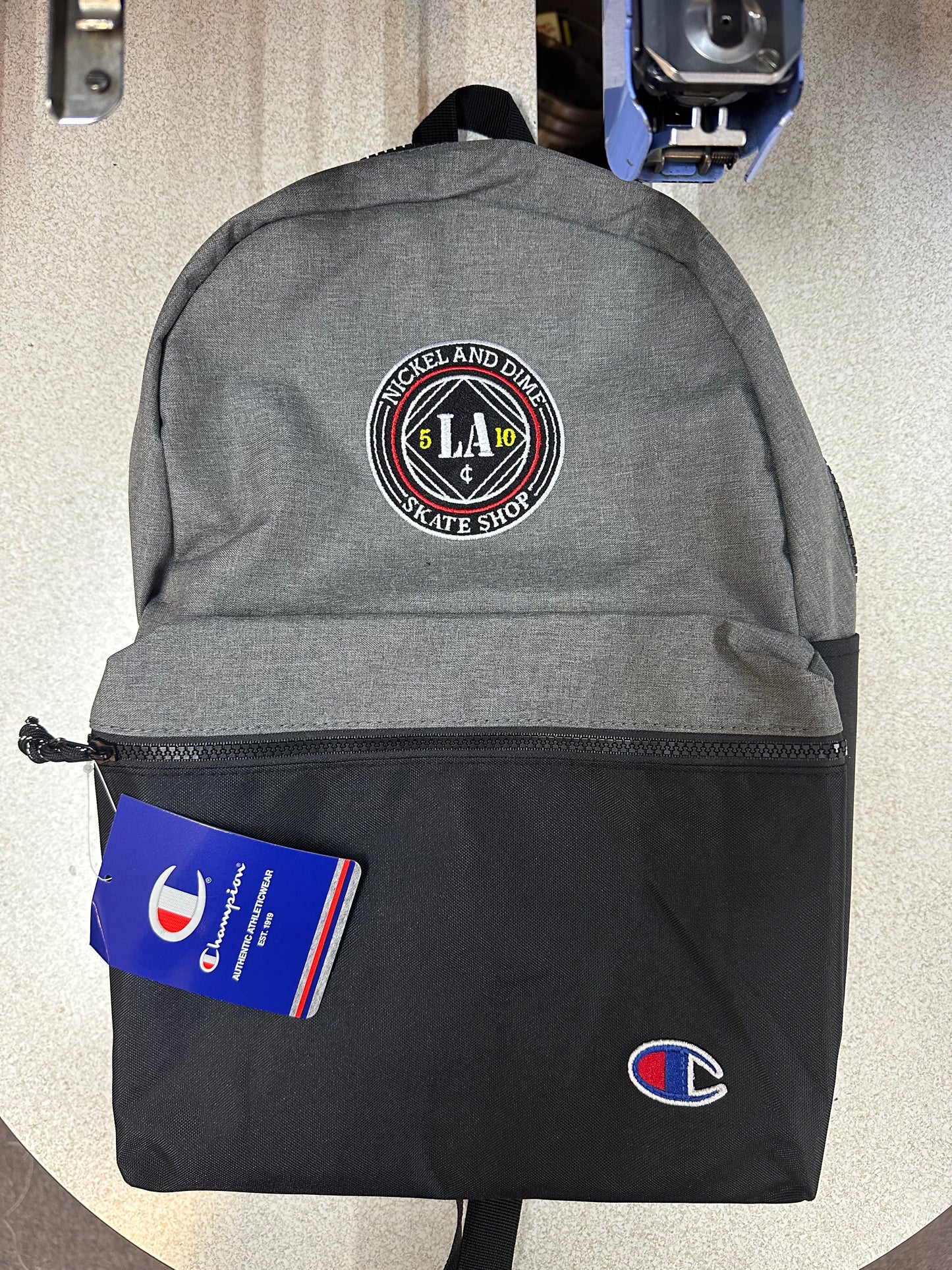 Nickel and Dime skate shop x Champion Back pack